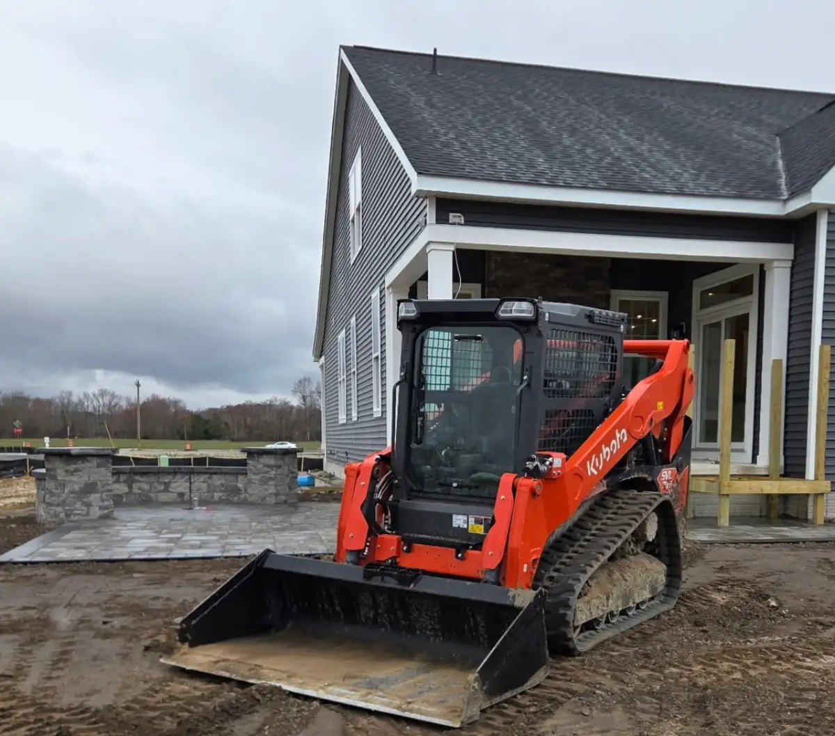 Just Imagine Hardscapes and Pools team on a project site in Sussex County Delaware